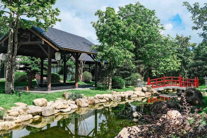 Hot spring retreat at Bang Onsen, surrounded by green hills